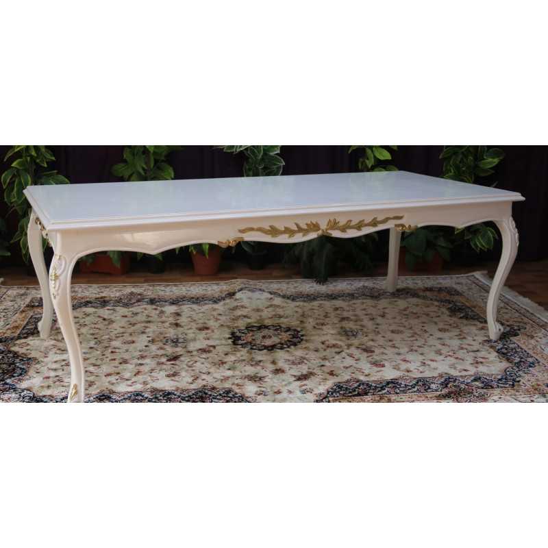 TABLE REPAS DE STYLE LOUIS XV - LAQUE BLANC RELIEFS OR - 240x110 - PROMO !Les MEUBLES DOBOIS vous propose cette magnifique TABLE DE SALLE À MANGER DE STYLE LOUIS XV au prix promotionnel de 999€ TTC au lieu de 1 440€ TTC, sous condition de l’achat simultané d’un minimum de 6 chaises sur une même commande.La structure, comprenant les pieds et la ceinture, est entièrement réalisée en bois de hêtre massif.La finition est réalisée en laque blanche, avec les reliefs et sculptures délicatement rehaussés d’une peinture dorée afin de mettre en valeur les détails du travail du bois.Le plateau est fabriqué en bois semi massif.Dimensions : 240 × 110 cmCapacité : 8 à 10 convives