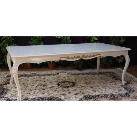 TABLE REPAS DE STYLE LOUIS XV - LAQUE BLANC RELIEFS OR - 240x110 - PROMO !Les MEUBLES DOBOIS vous propose cette magnifique TABLE DE SALLE À MANGER DE STYLE LOUIS XV au prix promotionnel de 999€ TTC au lieu de 1 440€ TTC, sous condition de l’achat simultané d’un minimum de 6 chaises sur une même commande.La structure, comprenant les pieds et la ceinture, est entièrement réalisée en bois de hêtre massif.La finition est réalisée en laque blanche, avec les reliefs et sculptures délicatement rehaussés d’une peinture dorée afin de mettre en valeur les détails du travail du bois.Le plateau est fabriqué en bois semi massif.Dimensions : 240 × 110 cmCapacité : 8 à 10 convives
