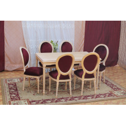 TABLE REPAS DE STYLE LOUIS XVI 130x85 - PROMO STOCK !Les MEUBLES DOBOIS vous propose cette élégante TABLE DE SALLE À MANGER DE STYLE LOUIS XVI au prix promotionnel de 399€ TTC au lieu de 999€ TTC, sous condition de l’achat simultané d’un minimum de 6 chaises sur une même commande.La structure, comprenant les pieds et la ceinture, est entièrement réalisée en bois de hêtre massif.La finition est composée d’une patine traditionnelle à base de feuille d’or, appliquée sur une assiette rougeâtre, puis légèrement patinée et blanchie afin de lui donner un aspect ancien et authentique.Le plateau est fabriqué en bois lamellé et agrémenté d’une marqueterie raffinée, apportant élégance et caractère à l’ensemble.Dimensions : 130 × 85 cmCapacité : 6 convives