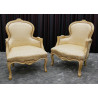 LOT 2 FAUTEUILS BERGÈRES CABRIOLET DE STYLE LOUIS XV OU DE STYLE BAROQUE - OR blanc avec un tissu crème et or