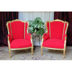 LOT 2 FAUTEUILS BERGÈRES DE STYLE BAROQUE OU DE STYLE LOUIS XVI - Bois doré et velours rouge - Fauteuil du Père Noël