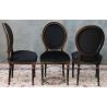 LOT 6 à 28 CHAISES MEDAILLON EN STOCK - Bois noir et brut Velours noirLot 6 à 28 Chaises Médaillon en stock au prix de 199€ l’unité au lieu de 249€, dans la limite des stocks disponibles.La finition du bois est réalisée avec un vernis noir appliqué sur le hêtre massif. Après vernissage, certaines parties et certains reliefs sont poncés manuellement à la main afin de faire réapparaître volontairement le bois brut sous la finition noire.Ce travail artisanal crée un effet patiné et légèrement vieilli, avec un contraste naturel entre le noir verni et le bois brut apparent. Cette finition est associée à un revêtement en velours noir.Caractéristiques :Style : Louis XVI / MédaillonStructure : hêtre 100% massifFabrication : renforcée pour une utilisation quotidienne ou intensiveUtilisation : particuliers, restaurants, hôtels, cafés et professionnelsRevêtement : velours noir moderneFinition : bois verni noir avec ponçage manuel faisant apparaître le bois brut par endroitsEffet : patiné et légèrement vieilliHauteur d’assise : 48/50 cmHauteur totale : 100/101 cmLargeur : 48/50cmMinimum de commande : 6 chaisesPrix sur commande après épuisement du stock : 249€ l’unité (Une fois le stock épuisé, ce modèle restera disponible sur commande au tarif de 249€ l’unité.)