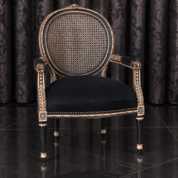 FAUTEUIL MÉDAILLON DOSSIER CANNÉ - Bois vernis noir poncé brut - Cannage - Assise Coton noirLes Meubles DOBOIS vous propose ce magnifique fauteuil Médaillon de style Louis XVI, disponible en stock et fabriquée dans nos ateliers selon des méthodes traditionnelles.Structure en hêtre 100% massif avec une finition vernis noir et poncé à la main sur les reliefs pour faire apparaître le bois brut en dessous. Garniture traditionnelle avec ressorts, crin et sangles, pour une assise confortable et durable.Ce modèle peut également être fabriqué sur commande avec un large choix de tissus : velours, lin, coton, simili cuir, cuir, ainsi que différentes finitions de bois.Livraison assurée par nos soins, avec protection individuelle des fauteuils dans des couvertures et mousses de calage pendant le transport.