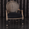 FAUTEUIL MÉDAILLON DOSSIER CANNÉ - Bois vernis noir poncé brut - Cannage - Assise Coton noirLes Meubles DOBOIS vous propose ce magnifique fauteuil Médaillon de style Louis XVI, disponible en stock et fabriquée dans nos ateliers selon des méthodes traditionnelles.Structure en hêtre 100% massif avec une finition vernis noir et poncé à la main sur les reliefs pour faire apparaître le bois brut en dessous. Garniture traditionnelle avec ressorts, crin et sangles, pour une assise confortable et durable.Ce modèle peut également être fabriqué sur commande avec un large choix de tissus : velours, lin, coton, simili cuir, cuir, ainsi que différentes finitions de bois.Livraison assurée par nos soins, avec protection individuelle des fauteuils dans des couvertures et mousses de calage pendant le transport.
