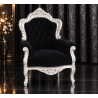 FAUTEUIL DE STYLE BAROQUE - Bois argent avec un velours noir - PROMO STOCKLes Meubles DOBOIS vous propose ce gros fauteuil baroque, fabriqué dans nos ateliers selon des méthodes traditionnelles.Structure en hêtre 100% massif avec finition à la feuille d’argent. Garniture avec assise confortable et revêtement en velours noir, pour un rendu élégant et contrasté.Ce fauteuil baroque imposant apportera beaucoup de caractère à un salon, une chambre ou un espace de réception.Ce modèle peut également être fabriqué sur commande avec un large choix de tissus, velours, lin, coton, simili cuir, cuir ainsi que différentes finitions de bois.Livraison assurée par nos soins, avec protection du fauteuil dans des couvertures et mousses de calage pendant le transport. 