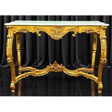 CONSOLE STYLE BAROQUE - FEUILLE D'OR - MARBRE Blanc - 115cmMagnifique Console Baroque en bois de hêtre massif patiné à la feuille feuille d'or. Fabrication dans nos atelier en bois de hêtre 100% massif, sculpté à la main, chaque pièce est donc unique. Plateau en Marbre blanc.Possibilité de fabrication sur mesure avec choix des dimensions, de la forme, du modèle et des finitions : bois laqué, vernis ou marqueterie. Consultez notre catalogue pour découvrir toutes les options disponibles.