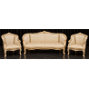 Salon Marquise Style Louis XV - Canapé 3 places 210cm et 2 Fauteuils - Bois patine or blanc et tissus crème et orCanapé Marquise Style Louis XV et 2 Fauteuils en Gondole Style Louis XV.Fabrication haut de gamme avec une structure en bois de hêtre massif, sculptée à la main, puis patinée à la feuille d'or, légèrement blanchie et légèrement patinée. Cette patine est une exclusivité des MEUBLES DOBOIS. La garniture est en crin végétal, ressorts et sangles. Le tissu est un satiné crème avec des broderies dorées.Prix :- 2 079.00€ le canapé en 3 place 210cm (9€ le cm en largeur +10% pour la feuille d'or)- 987.80€ le lot de 2 Fauteuils Cabriolet en Gondole de Style Louis XV (449€ le fauteuil +10% pour la feuille d'or)Options :- 60€ le coussin d'assise 65x55- 45€ le coussin de dossier 45x45